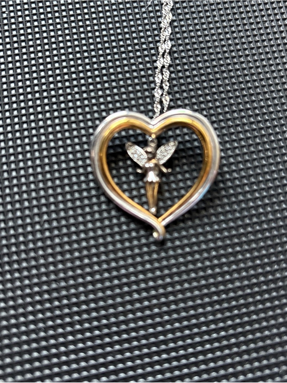 Silver/gold  Heart Necklace w/twirling fairy Charm and believe engraved back